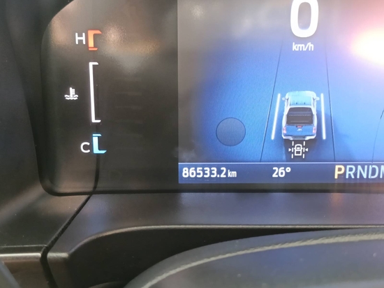 Dashboard odometer photographed before the road test
