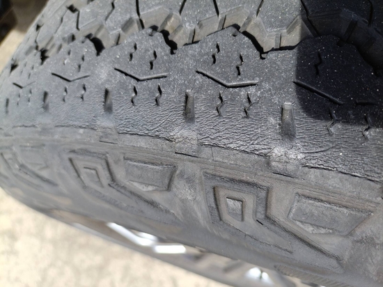 Rear tyre showing perished rubber, graded unroadworthy